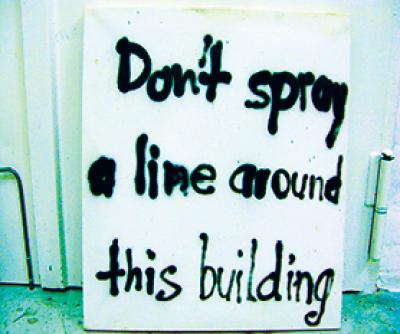 DON'T SPRAY A LINE AROUND THIS BUILDING